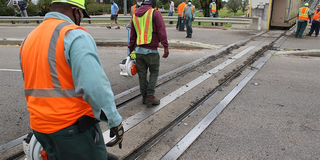 Workers at one of the flood gates in the New Orleans area.(Flood Protection Authority East)