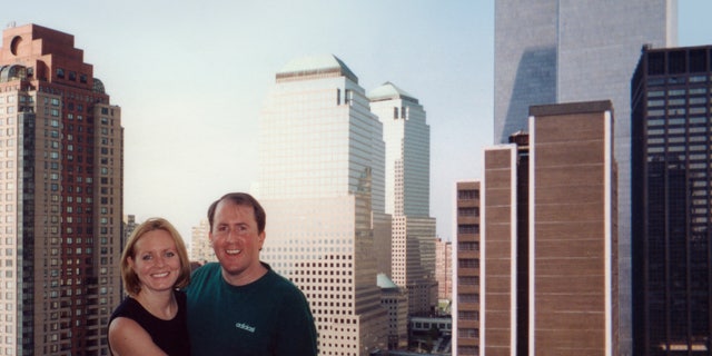 Christina Stanton and her husband Brian on their apartment terrace with the Twin Towers in the background just two weeks before the 9/11 terror attacks. Courtesy: Christina Stanton