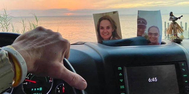 Scott Christmas had kept the photo of his late wife, Amy, on the dashboard of the Jeep for three years before lingering winds from Hurricane Sally blew it out of the vehicle.