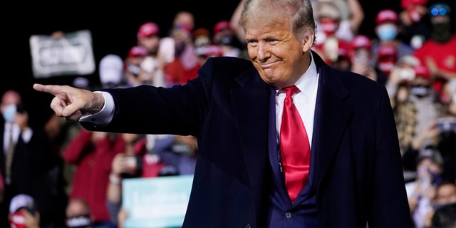 President Donald Trump wraps up his speech at a campaign rally at Fayetteville Regional Airport, Saturday, Sept. 19, 2020, in Fayetteville, NC (AP Photo/Evan Vucci