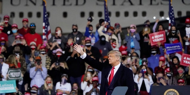 President Donald Trump addresses a crowd at Fayetteville Regional Airport in Fayetteville, N.C., Sept. 19, 2020. (Associated Press)