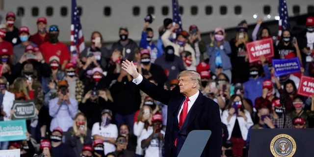 President Donald Trump addresses a crowd at Fayetteville Regional Airport in Fayetteville, N.C., Sept. 19, 2020. (Associated Press)