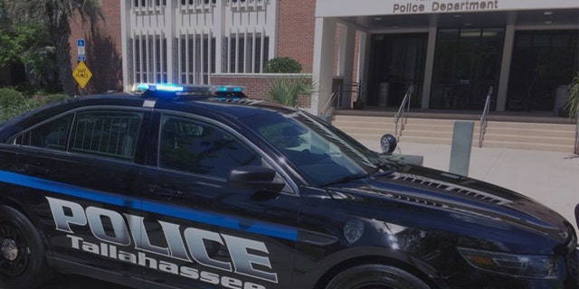 A Tallahassee police car in front of headquarters.