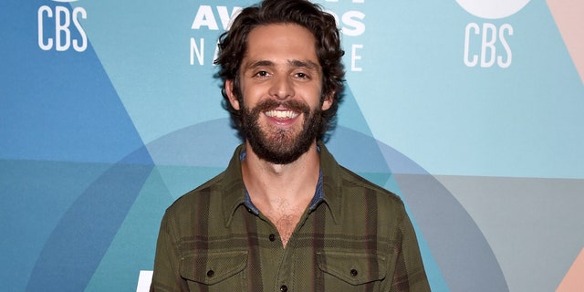 Thomas Rhett scored an early win for his 'Remember You Young' music video. He also tied for the night's biggest award, entertainer of the year, with Carrie Underwood. (Photo by John Shearer/ACMA2020/Getty Images for ACM)