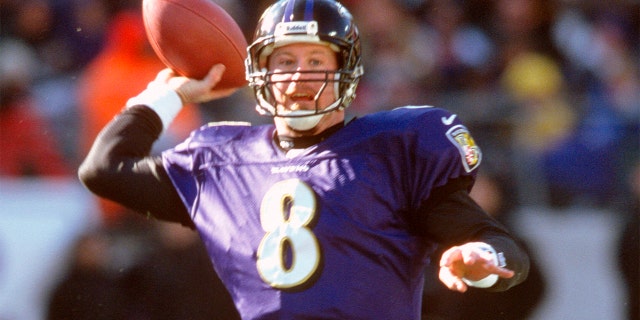 Trent Dilfer #8 of the Baltimore Ravens throws a pass against the Denver Broncos during the AFC Wild Card Game December 31, 2000 at PSINet Stadium in Baltimore, Maryland. The Ravens won the game 21-3.. (Photo by Focus on Sport/Getty Images)