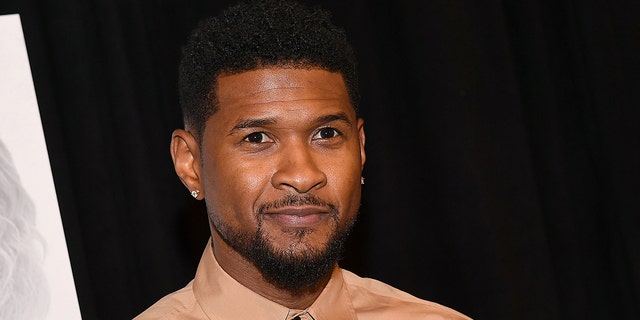 R&amp;B singer Usher is getting flack on Twitter for allegedly using fake money with his own name and face on it at a strip club.<br>
However, the club says it’s all a big misunderstanding, and Usher did not use fake money.  (Photo by Paras Griffin/Getty Images)