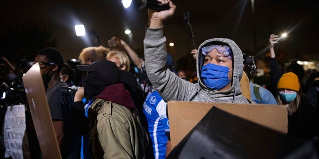 Protesters clash with deputies of the Los Angeles Sheriff's Department during protests following the death of Dijon Kizzee on Aug. 31, in Los Angeles. (AP Photo/Christian Monterrosa)