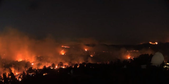 Flames can be seen nearing the Mount Wilson Observatory on Monday, Sept. 21, 2020.