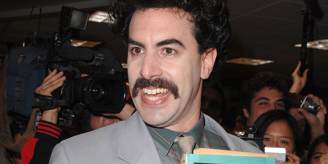 Sacha Baron Cohen as his fictional character Borat. 