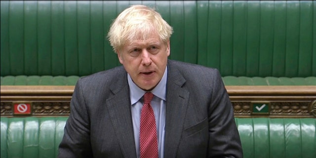 FILE - in this September file photo, British Prime Minister Boris Johnson, shown here speaking in the House of Commons announcing new coronavirus prevention restrictions. (AP/House of Commons)