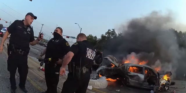 Police thanked the citizens of Dallas for helping to save the trapped man before the flames engulfed the car.