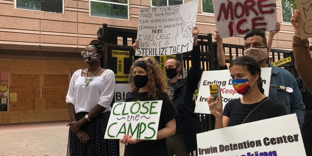 Dawn Wooten, left, a nurse at Irwin County Detention Center in Ocilla, Georgia, speaks at a news conference in Atlanta on Sept. 15 protesting conditions at the immigration jail. (AP)