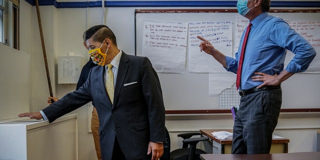 NYC School Chancellor Richard Carranza, left, and Mayor Bill de Blasio on Aug. 26 during an inspection of health safeguard protocols for COVID-19 at Bronx Collaborative High School in New York. (AP)