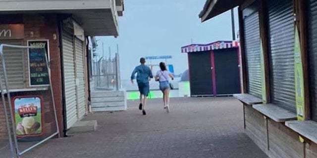 A manager at My Big Fat Greek Taverna filmed the couple as they ran.