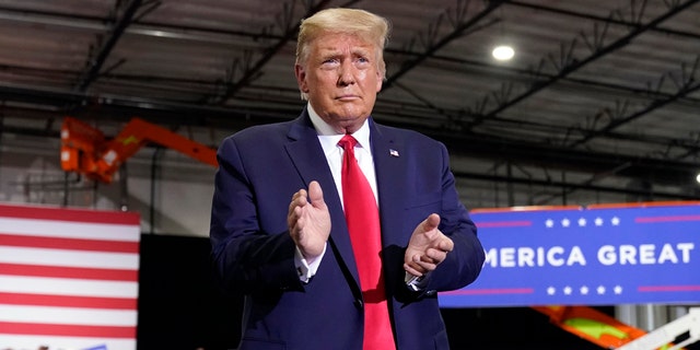 President Donald Trump arrives to speak at a rally at Xtreme Manufacturing, Sunday, Sept. 13, 2020, in Henderson, Nev. Trump said Tuesday that a coronavirus vaccine could be available in 