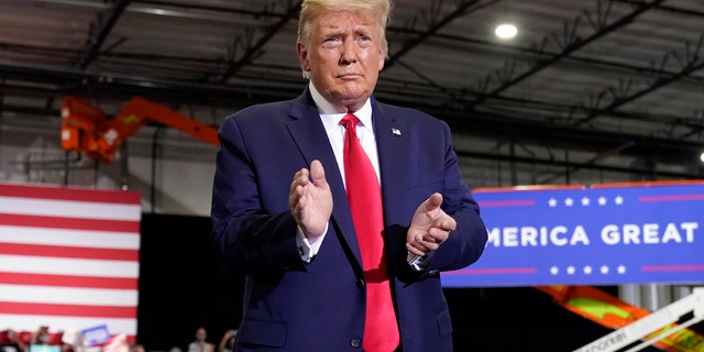 President Donald Trump arrives to speak at a rally at Xtreme Manufacturing, Sunday, Sept. 13, 2020, in Henderson, Nev. (AP Photo/Andrew Harnik)