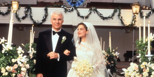 Steve Martin walking down the aisle with Kimberly Williams-Paisley in a scene from the film 'Father Of The Bride', 1991. (Photo by Touchstone/Getty Images)