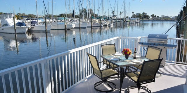 Dreamy amenitites include gorgeous outdoor decks with seating and a gas grill.