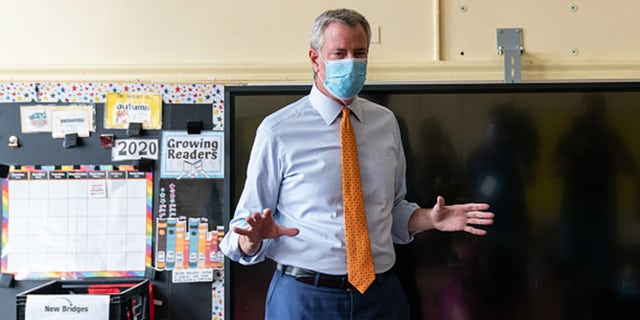 New York Mayor Bill de Blasio speaks during a press conference at New Bridges Elementary School in the Brooklyn neighborhood of New York on Wednesday, August 19, 2020 (Jeenah Moon / Bloomberg via Getty Images)