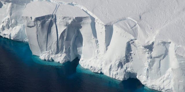 Ice shelves in Antarctica, such as the Getz Ice Shelf seen here, are sensitive to warming ocean temperatures. Ocean and atmospheric conditions are some of the drivers of ice sheet loss that scientists considered in a new study estimating additional global sea level rise by 2100. Credits: Jeremy Harbeck/NASA