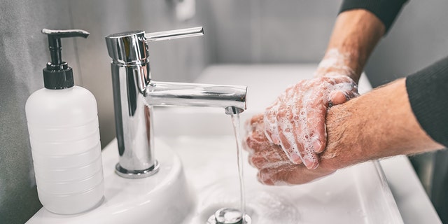 Washing hands rubbing with soap man for coronavirus prevention, hygiene to stop spreading coronavirus. (iStock)