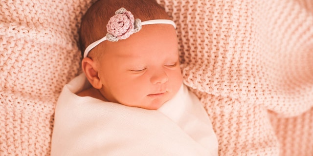 This sweet baby girl doesn't have a care in the world — and a new baby monitor can help parents watch the little one while she's napping and they're out of the room.