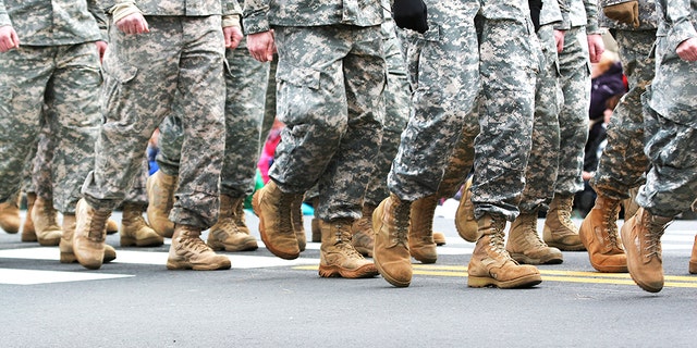Soldiers dressed in army camouflage in an army parade
