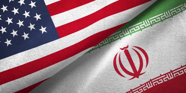 Iran and United States flags together realtions textile cloth fabric texture