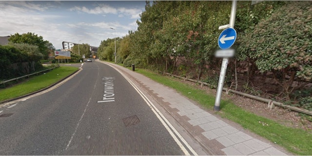 Ironworks Road is a one-way, two-lane road adjacent to a highway.