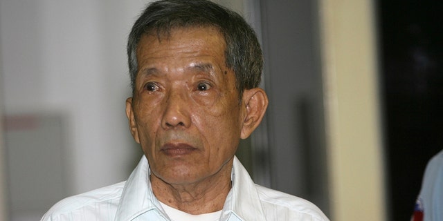 <br>
​​​​​​Former Khmer Rouge prison chief Kaing Guek Eav, also know as Duch, looks on during the first day of a U.N.-backed tribunal in Phnom Penh, Cambodia, March 30, 2020. (Associated Press)