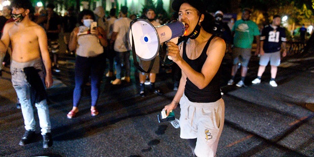 Black Lives Matter protesters block West Chestnut Street at North Prince Street near the Lancaster city police station on Sunday, Sept. 13, 2020. A man was shot by police earlier in the day after a reported domestic dispute, police said. A Lancaster city police officer fired at a 27-year-old man who was armed with a knife. The man, identified as Ricardo Munoz, was killed and pronounced dead at the scene, Blaine Shahan, LNP/LancasterOnline via AP)