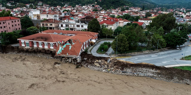 The medical centre of Mouzaki village is seen partially collapsed after a storm, near Karditsa town, Saturday, Sept. 19, 2020. 
