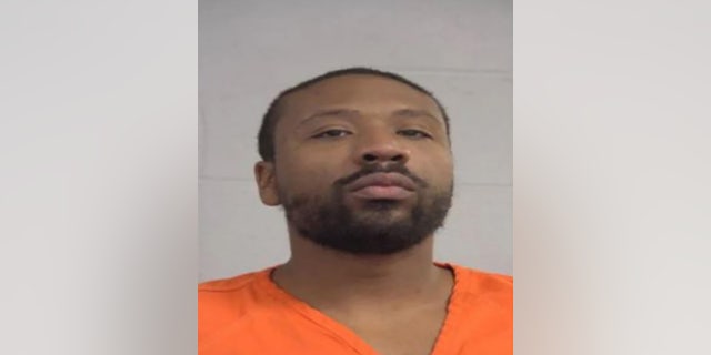 Michael E. Rhynes Jr., 33, was charged with three counts of murder and was held on a $2 million bond. (Louisville Metro Corrections)