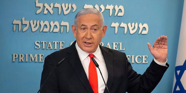 Israeli Prime Minister Benjamin Netanyahu speaks during a briefing on coronavirus development in Israel at his office in Jerusalem, Sunday, Sept. 13 2020. (Alex Kolomiensky/Yedioth Ahronoth via AP, Pool)