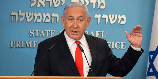 Israeli Prime Minister Benjamin Netanyahu speaks during a briefing on coronavirus development in Israel at his office in Jerusalem, Sunday, Sept. 13 2020. (Alex Kolomiensky/Yedioth Ahronoth via AP, Pool)