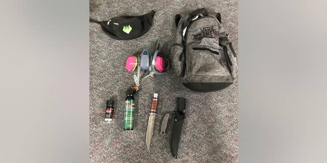 The Portland Police Bureau said those arrested were armed with knives and "OC" spray.