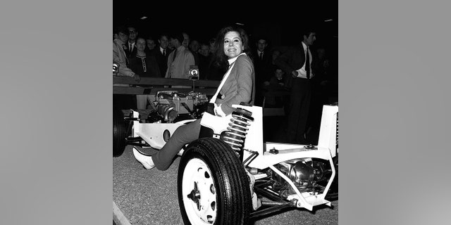 Rigg appeared on the Lotus stand at the 1965 Earls Court Motor Show.