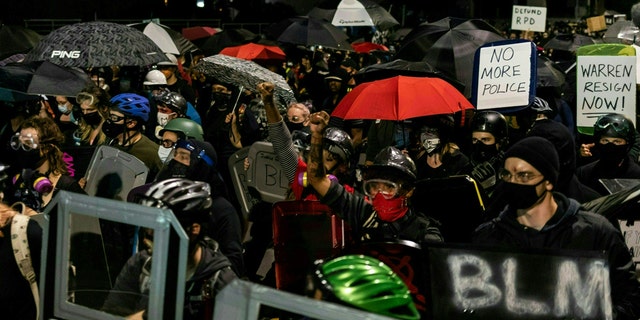 Protesters march for the sixth consecutive night of protest on September 7, 2020, following the release of video evidence that shows the death of Daniel Prude while in the custody of Rochester Police in Rochester, New York. (MARANIE R. STAAB/AFP via Getty Images)