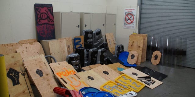 Police removed dozens of makeshift shields from the tents.