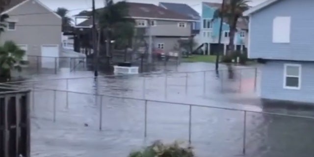 Storm surge flooding can be seen in Jamaica Beach, Texas as Tropical Storm Beta nears the coast.