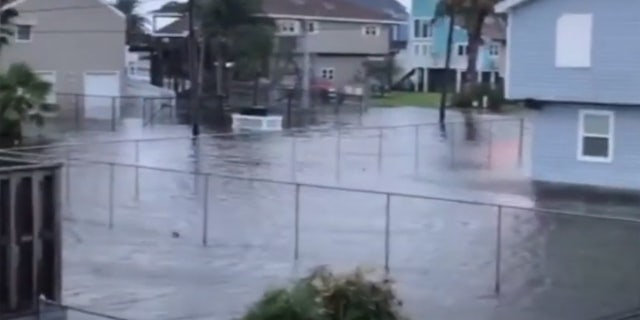 Storm surge flooding can be seen in Jamaica Beach, Texas as Tropical Storm Beta nears the coast.