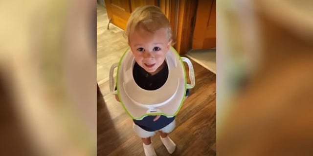Abbie Paull said she only took her eyes off her son, Reuben, for a few seconds when he somehow got his training toilet stuck around his neck.