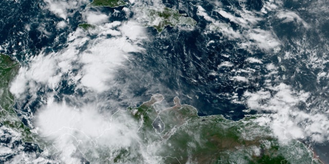 An area of disturbed weather over the Caribbean Sea could develop into a tropical system by the weekend, accoridng to forecasters.