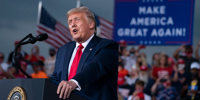 President Trump speaks during a campaign rally at Smith Reynolds Airport, Tuesday, Sept. 8, 2020, in Winston-Salem, N.C. (AP Photo/Evan Vucci)