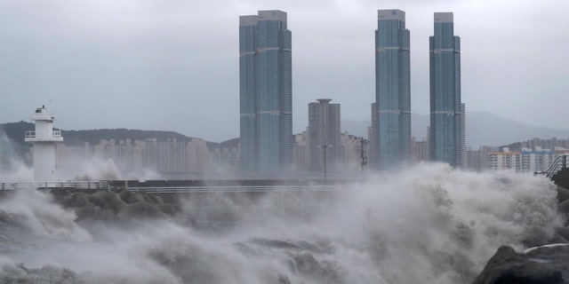High waves crash shore as Typhoon Haishen approaches in Busan, South Korea, Monday, Sept. 7, 2020.