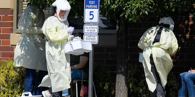 Wisconsin university quarantines students from 9 fraternities and sororities, as latest school grapples with coronavirus threat from parties 2 Workers test Utah State University students for COVID-19 on Aug. 30, in Hyde Park, Utah. Students from four dorms were tested and quarantined after the virus was detected in the wastewater from those buildings. (Eli Lucero/The Herald Journal via AP)