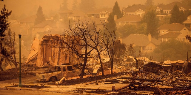 Homes leveled by the Glass Fire line a street in the Skyhawk neighborhood of Santa Rosa, Calif., on Monday, Sept. 28, 2020.