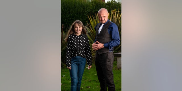 Hypnotherapist David Kilmurry with Martha Davies, 10, who could only eat toast before being cured with hypnotism.