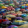 People enjoy the Ipanema beach amid the new coronavirus pandemic in Rio de Janeiro, Brazil, Sept. 6, 2020. 