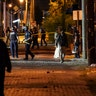 Police survey an area after a police officer was shot, Wednesday, Sept. 23, 2020, in Louisville, Ky. A grand jury has indicted one officer on criminal charges six months after Breonna Taylor was fatally shot by police in Kentucky.